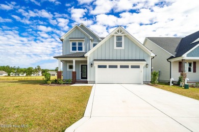 Discover coastal living at this new construction beauty in The on North River Club in North Carolina - for sale on GolfHomes.com, golf home, golf lot