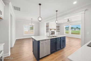 Discover coastal living at this new construction beauty in The on North River Club in North Carolina - for sale on GolfHomes.com, golf home, golf lot