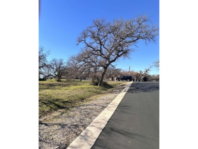 At the entrance of Powderhorn cul-de-sac, this corner lot is on Slick Rock Golf Course - Horseshoe Bay in Texas - for sale on GolfHomes.com, golf home, golf lot