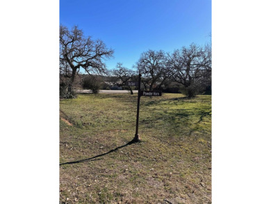 At the entrance of Powderhorn cul-de-sac, this corner lot is on Slick Rock Golf Course - Horseshoe Bay in Texas - for sale on GolfHomes.com, golf home, golf lot