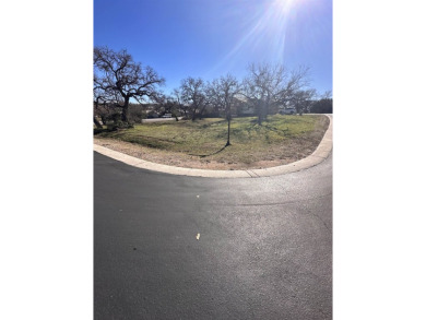 At the entrance of Powderhorn cul-de-sac, this corner lot is on Slick Rock Golf Course - Horseshoe Bay in Texas - for sale on GolfHomes.com, golf home, golf lot