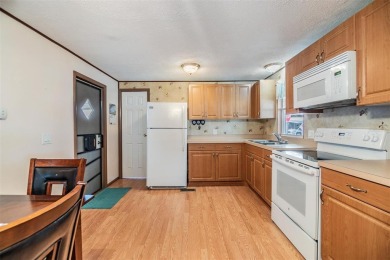 This beautifully updated home in Betmar Acres is an ideal on Betmar Acres Golf Club in Florida - for sale on GolfHomes.com, golf home, golf lot