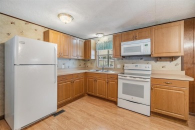 This beautifully updated home in Betmar Acres is an ideal on Betmar Acres Golf Club in Florida - for sale on GolfHomes.com, golf home, golf lot