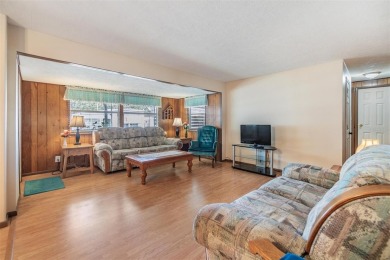 This beautifully updated home in Betmar Acres is an ideal on Betmar Acres Golf Club in Florida - for sale on GolfHomes.com, golf home, golf lot