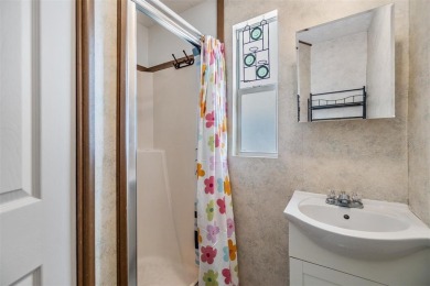This beautifully updated home in Betmar Acres is an ideal on Betmar Acres Golf Club in Florida - for sale on GolfHomes.com, golf home, golf lot