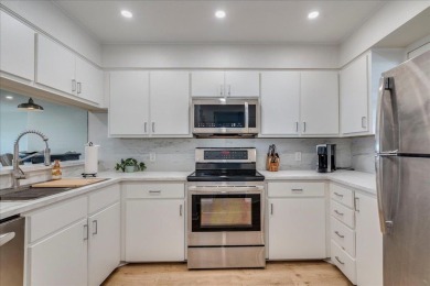 Discover LBJ lakeside living with this stunning lakefront condo on Horseshoe Bay Private Golf Course in Texas - for sale on GolfHomes.com, golf home, golf lot