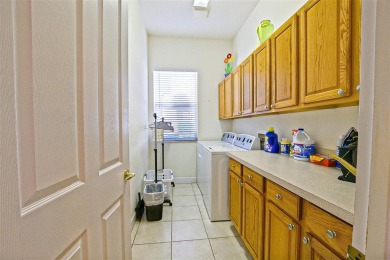 Stunning are the words you will use when you view this beautiful on Eagle Ridge At Spruce Creek Country Club in Florida - for sale on GolfHomes.com, golf home, golf lot