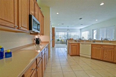 Stunning are the words you will use when you view this beautiful on Eagle Ridge At Spruce Creek Country Club in Florida - for sale on GolfHomes.com, golf home, golf lot