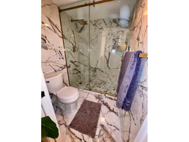 Recently updated bright corner unit in the Lands of the on The President Country Club in Florida - for sale on GolfHomes.com, golf home, golf lot