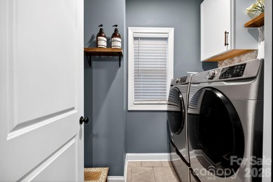 Immaculate and beautifully maintained, this golf course home on Tega Cay Golf Club in South Carolina - for sale on GolfHomes.com, golf home, golf lot