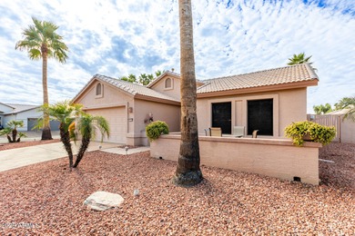Impeccably maintained 2-bedroom, 2-bathroom Doral model home on Tuscany Falls At Pebble Creek in Arizona - for sale on GolfHomes.com, golf home, golf lot