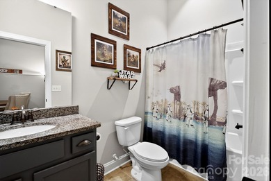 Immaculate and beautifully maintained, this golf course home on Tega Cay Golf Club in South Carolina - for sale on GolfHomes.com, golf home, golf lot