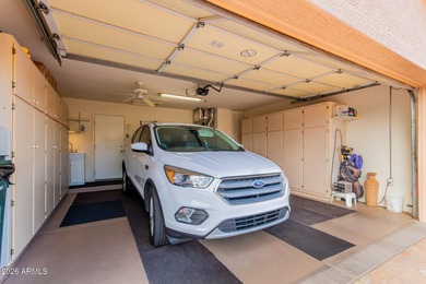 Impeccably maintained 2-bedroom, 2-bathroom Doral model home on Tuscany Falls At Pebble Creek in Arizona - for sale on GolfHomes.com, golf home, golf lot