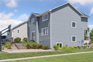 Step into luxury at 844 Indigo Lane, a custom-built home crafted on Northfield Golf Club in Minnesota - for sale on GolfHomes.com, golf home, golf lot