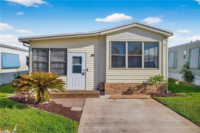 Experience the charm of relaxed Florida living in this lovingly on Del Tura Golf and Country Club in Florida - for sale on GolfHomes.com, golf home, golf lot