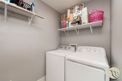 This wonderful home sits just moments from Lake Hills Golf on Lake Hills Golf Course in Montana - for sale on GolfHomes.com, golf home, golf lot