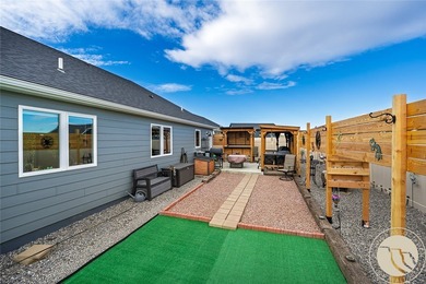 This wonderful home sits just moments from Lake Hills Golf on Lake Hills Golf Course in Montana - for sale on GolfHomes.com, golf home, golf lot