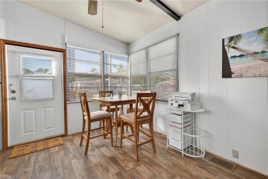Experience the charm of relaxed Florida living in this lovingly on Del Tura Golf and Country Club in Florida - for sale on GolfHomes.com, golf home, golf lot