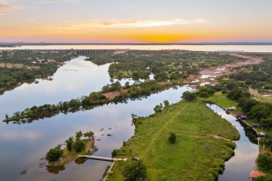 VIBRANT INKS LAKE COTTAGE -- Set on 1.2+ acres across two on Highland Lakes Golf Club in Texas - for sale on GolfHomes.com, golf home, golf lot