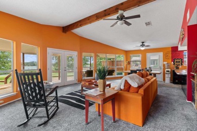 VIBRANT INKS LAKE COTTAGE -- Set on 1.2+ acres across two on Highland Lakes Golf Club in Texas - for sale on GolfHomes.com, golf home, golf lot
