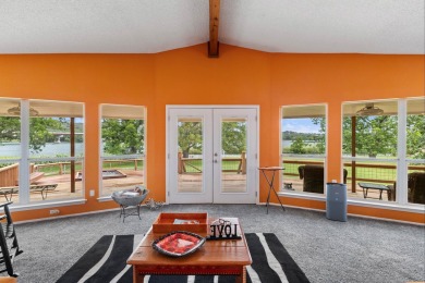VIBRANT INKS LAKE COTTAGE -- Set on 1.2+ acres across two on Highland Lakes Golf Club in Texas - for sale on GolfHomes.com, golf home, golf lot