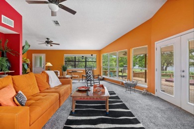 VIBRANT INKS LAKE COTTAGE -- Set on 1.2+ acres across two on Highland Lakes Golf Club in Texas - for sale on GolfHomes.com, golf home, golf lot