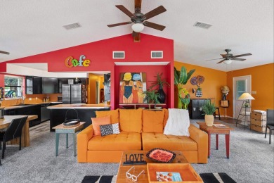 VIBRANT INKS LAKE COTTAGE -- Set on 1.2+ acres across two on Highland Lakes Golf Club in Texas - for sale on GolfHomes.com, golf home, golf lot