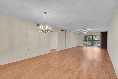 Deluxe Spacious Corner, Screened & Enclosed Balcony with Lake & on Wynmoor Golf Course in Florida - for sale on GolfHomes.com, golf home, golf lot