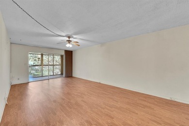 Deluxe Spacious Corner, Screened & Enclosed Balcony with Lake & on Wynmoor Golf Course in Florida - for sale on GolfHomes.com, golf home, golf lot