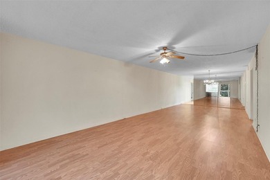 Deluxe Spacious Corner, Screened & Enclosed Balcony with Lake & on Wynmoor Golf Course in Florida - for sale on GolfHomes.com, golf home, golf lot