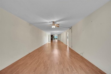 Deluxe Spacious Corner, Screened & Enclosed Balcony with Lake & on Wynmoor Golf Course in Florida - for sale on GolfHomes.com, golf home, golf lot