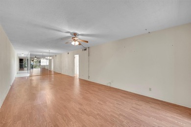 Deluxe Spacious Corner, Screened & Enclosed Balcony with Lake & on Wynmoor Golf Course in Florida - for sale on GolfHomes.com, golf home, golf lot