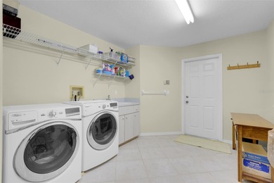 Under contract-accepting backup offerse discover this hidden gem on Green Valley Country Club in Florida - for sale on GolfHomes.com, golf home, golf lot