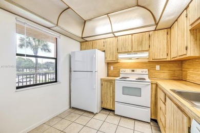 Gorgeous & Spacious CORNER UNIT with Huge Enclosed Balcony with on  in Florida - for sale on GolfHomes.com, golf home, golf lot
