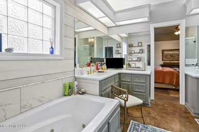 Located on the 8th hold of Deerfield Golf Club, this desirable on Colonial Country Club Deerfield in Mississippi - for sale on GolfHomes.com, golf home, golf lot