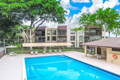 Gorgeous & Spacious CORNER UNIT with Huge Enclosed Balcony with on  in Florida - for sale on GolfHomes.com, golf home, golf lot