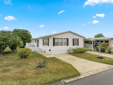 Enjoy easy coastal living in this fully furnished 3-bedroom on Barefoot Bay Golf Course in Florida - for sale on GolfHomes.com, golf home, golf lot