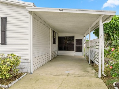 Enjoy easy coastal living in this fully furnished 3-bedroom on Barefoot Bay Golf Course in Florida - for sale on GolfHomes.com, golf home, golf lot