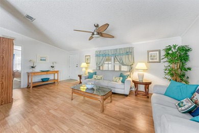 Enjoy easy coastal living in this fully furnished 3-bedroom on Barefoot Bay Golf Course in Florida - for sale on GolfHomes.com, golf home, golf lot