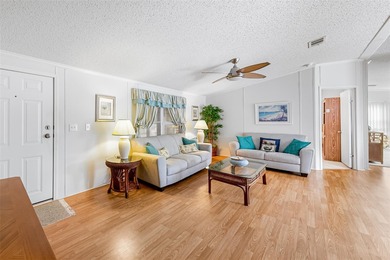 Enjoy easy coastal living in this fully furnished 3-bedroom on Barefoot Bay Golf Course in Florida - for sale on GolfHomes.com, golf home, golf lot