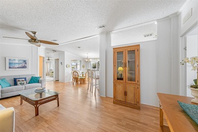 Enjoy easy coastal living in this fully furnished 3-bedroom on Barefoot Bay Golf Course in Florida - for sale on GolfHomes.com, golf home, golf lot