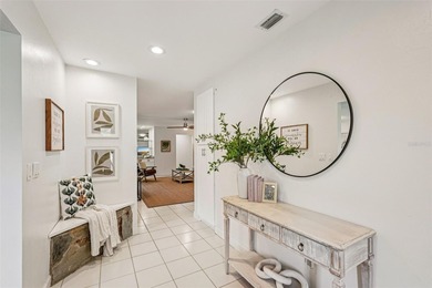 Tasteful three bedroom, two bath residence with heated private on The Meadows Golf and Country Club in Florida - for sale on GolfHomes.com, golf home, golf lot