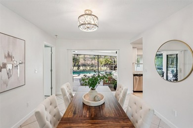 Tasteful three bedroom, two bath residence with heated private on The Meadows Golf and Country Club in Florida - for sale on GolfHomes.com, golf home, golf lot