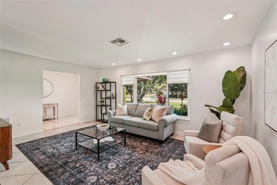 Tasteful three bedroom, two bath residence with heated private on The Meadows Golf and Country Club in Florida - for sale on GolfHomes.com, golf home, golf lot