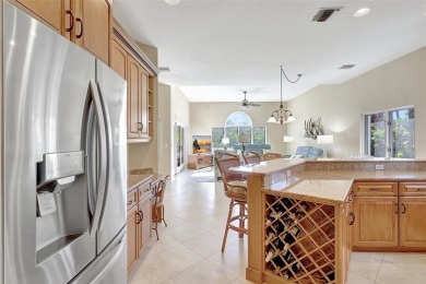 This stunning 4-bedroom home, located on the tranquil Bay Isles on Longboat Key Golf Club in Florida - for sale on GolfHomes.com, golf home, golf lot