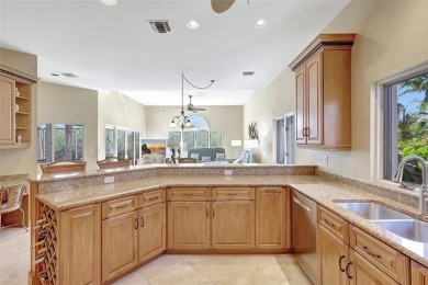 This stunning 4-bedroom home, located on the tranquil Bay Isles on Longboat Key Golf Club in Florida - for sale on GolfHomes.com, golf home, golf lot