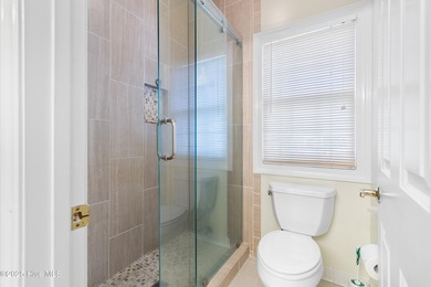 Welcome to this 3,700 sq ft custom brick home, thoughtfully on Members Club At St. James Plantation in North Carolina - for sale on GolfHomes.com, golf home, golf lot