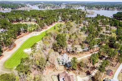 Nestled on the edge of the prestigious National Bluff course on Reynolds Lake Oconee - The Oconee in Georgia - for sale on GolfHomes.com, golf home, golf lot