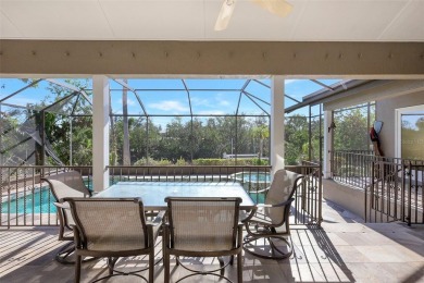 This stunning 4-bedroom home, located on the tranquil Bay Isles on Longboat Key Golf Club in Florida - for sale on GolfHomes.com, golf home, golf lot