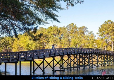 Nestled on the edge of the prestigious National Bluff course on Reynolds Lake Oconee - The Oconee in Georgia - for sale on GolfHomes.com, golf home, golf lot